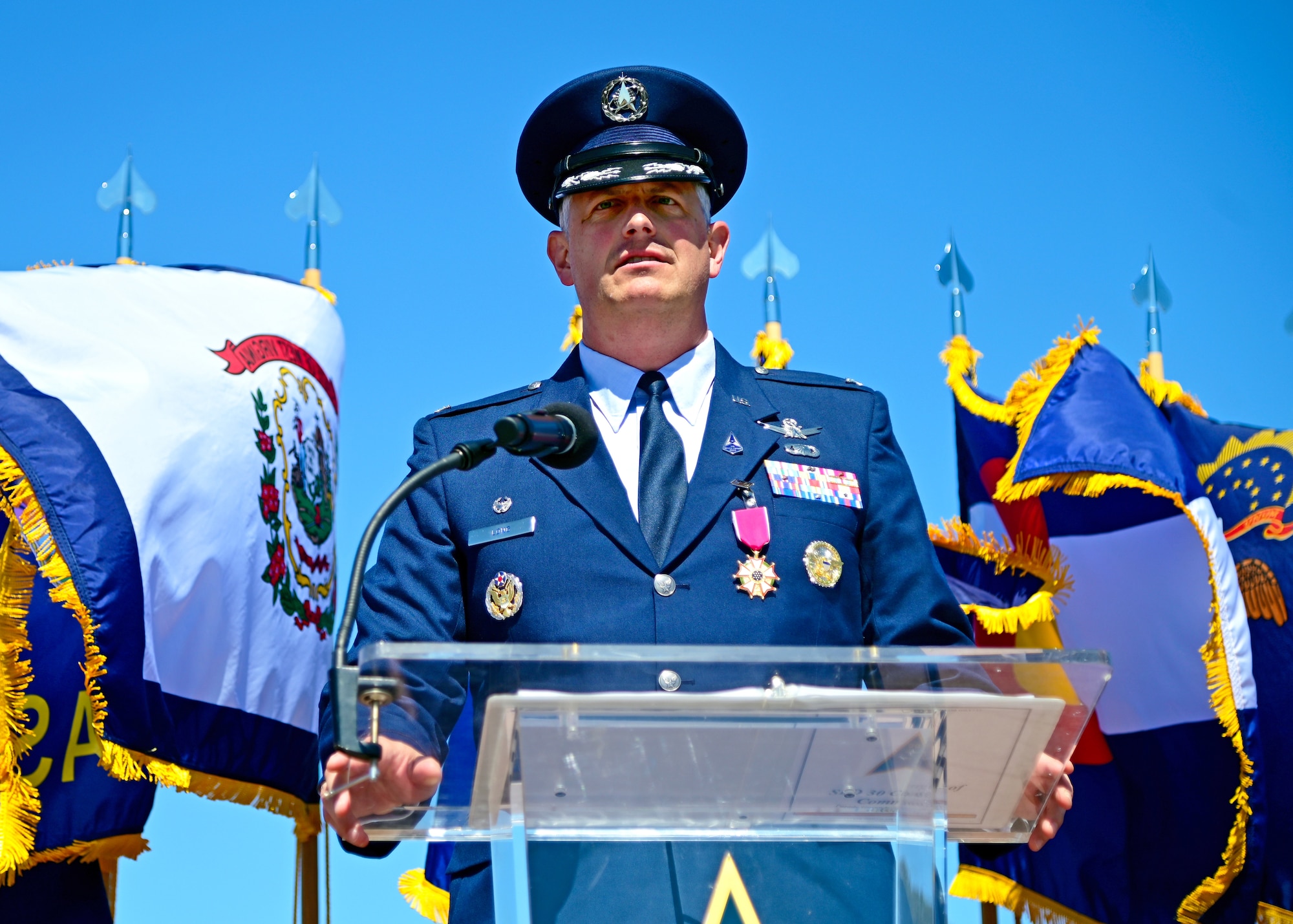 U.S. Space Force Col. Robert Long gives a speech during the Space Launch Delta 30 change of command ceremony on Vandenberg Space Force Base, Calif., July 13, 2023. Long relinquished command to U.S. Space Force Col. Mark Shoemaker. U.S. Space Force Lt. Gen. Michael Guetlein, Space Systems Command commander, presided over the ceremony. (U.S. Space Force photo by Airman 1st Class Ryan Quijas)