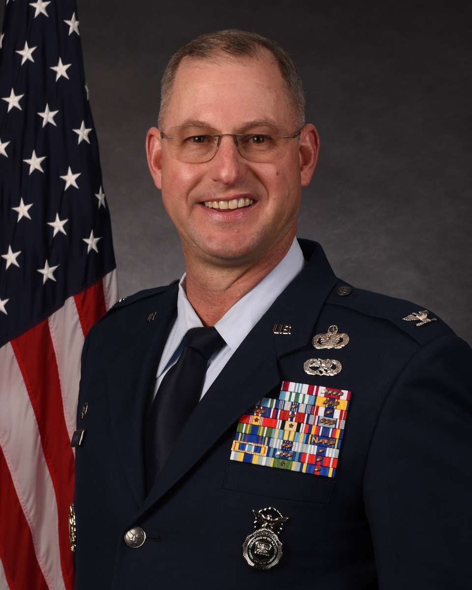 Col. Justin Secrest, 90th Security Forces Group commander, takes his official photo on F.E. Warren Air Force Base, Wyo. June 6, 2023. (U.S. Air Force photo)