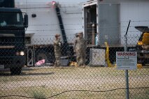 Airmen from the 91st Missile Maintenance Squadron work inside a missile site at Minot Air Force Base, July 10, 2023. The Airmen participated in an operation which aimed to test agile combat employment concepts using a Minute Man III intercontinental ballistic missile.  (U.S. Air Force photos by Airman 1st Class Trust Tate)