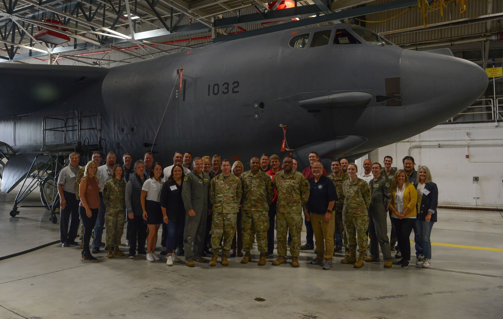 Minot city leaders pose for a photo in front of B-52H Stratofortress at Minot Air Force Base, North Dakota, July 13, 2023. The B-52H has been assigned to Minot Air Force Base since 1968 and plays a critical role in the 5th Bomb Wing mission with its ability to perform strategic attack, air, interdiction, offensive counter-air and maritime operations. (U.S. Air Force photo by Airman 1st Class Trust Tate)