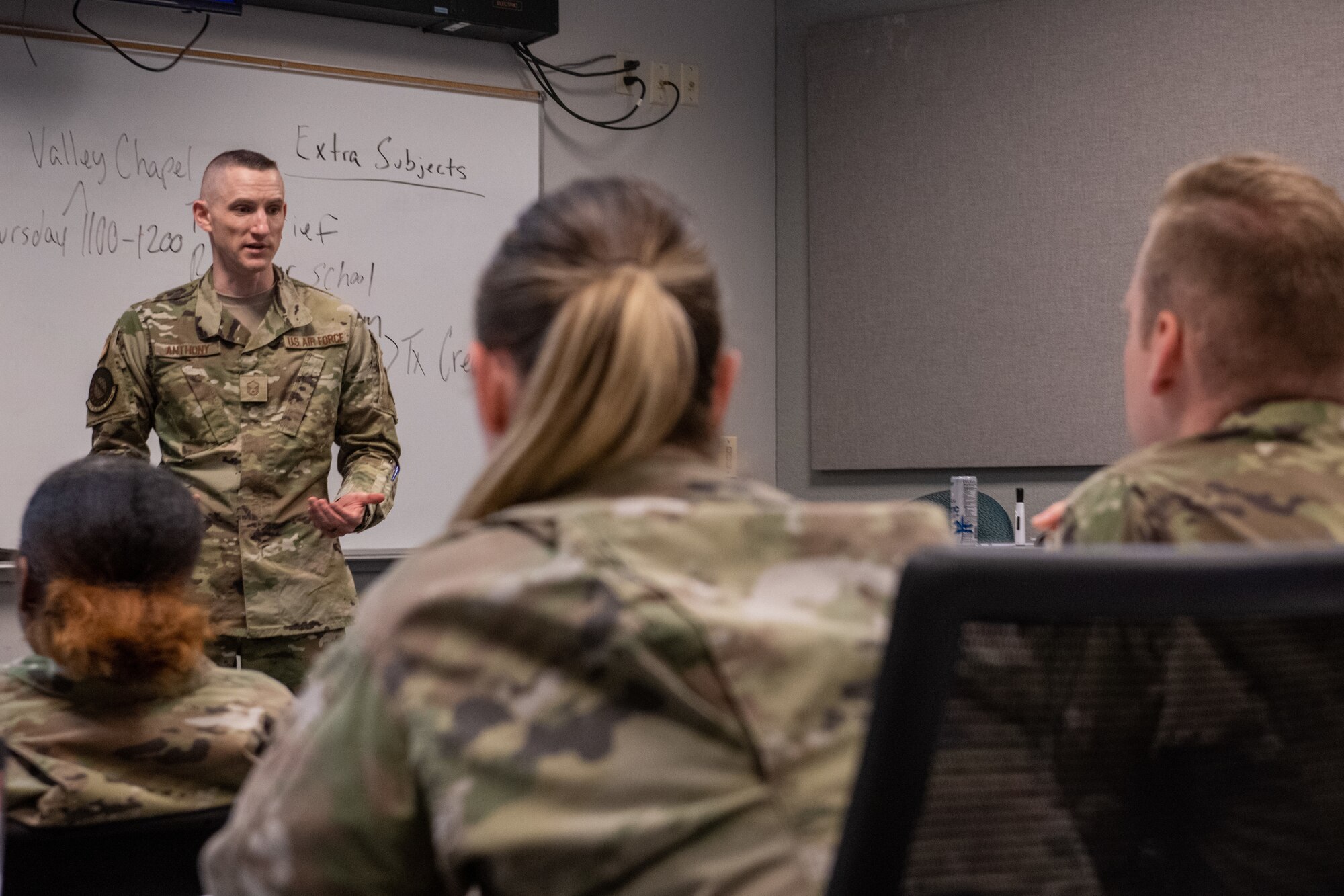 U.S. Air Force Master Sgt. Aaron Anthony, 48th Intelligence Support Squadron section chief, teaches about maintaining good credit in the military during a professional enhancement course July 12, 2023, at Beale Air Force Base, California.