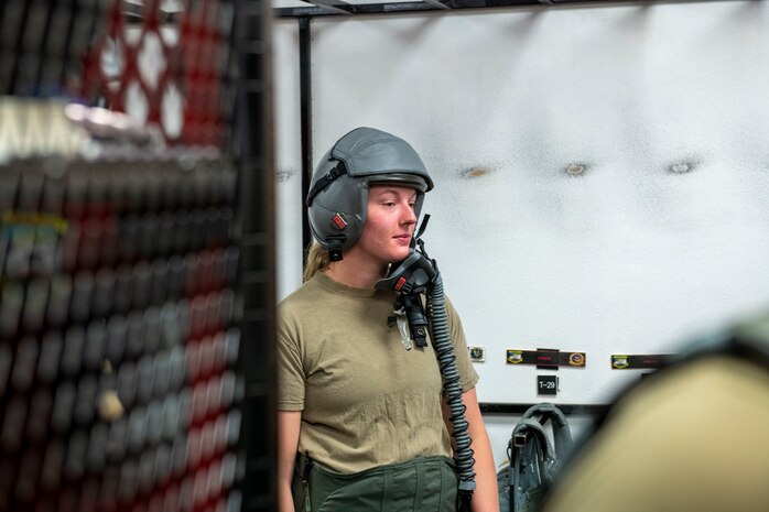 U.S. Air Force Senior Airman Hayley D’incau, 13th Intelligence Squadron geospatial analyst, waits in the pilot’s locker room for the flight breathing simulation July 14, 2023, at Beale Air Force Base, California.