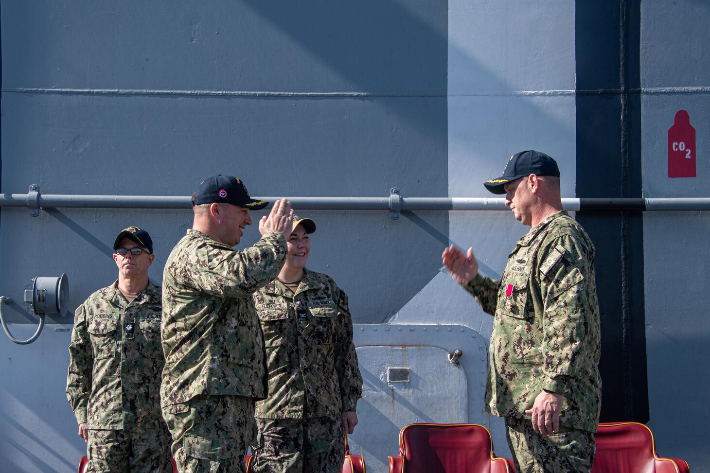 Capt. Manuel Pardo, left, eighth commanding officer of the forward-deployed amphibious assault carrier USS America (LHA 6), assumes command from Capt. Shockey Snyder at a change of command on the ship’s flight deck during a scheduled port visit to Brisbane, Australia, July 14, 2023. America, lead ship of the America Amphibious Ready Group, is operating in the U.S. 7th Fleet area of operations. U.S. 7th Fleet is the U.S. Navy’s largest forward-deployed numbered fleet, and routinely interacts and operates with allies and partners in preserving a free and open Indo-Pacific region.