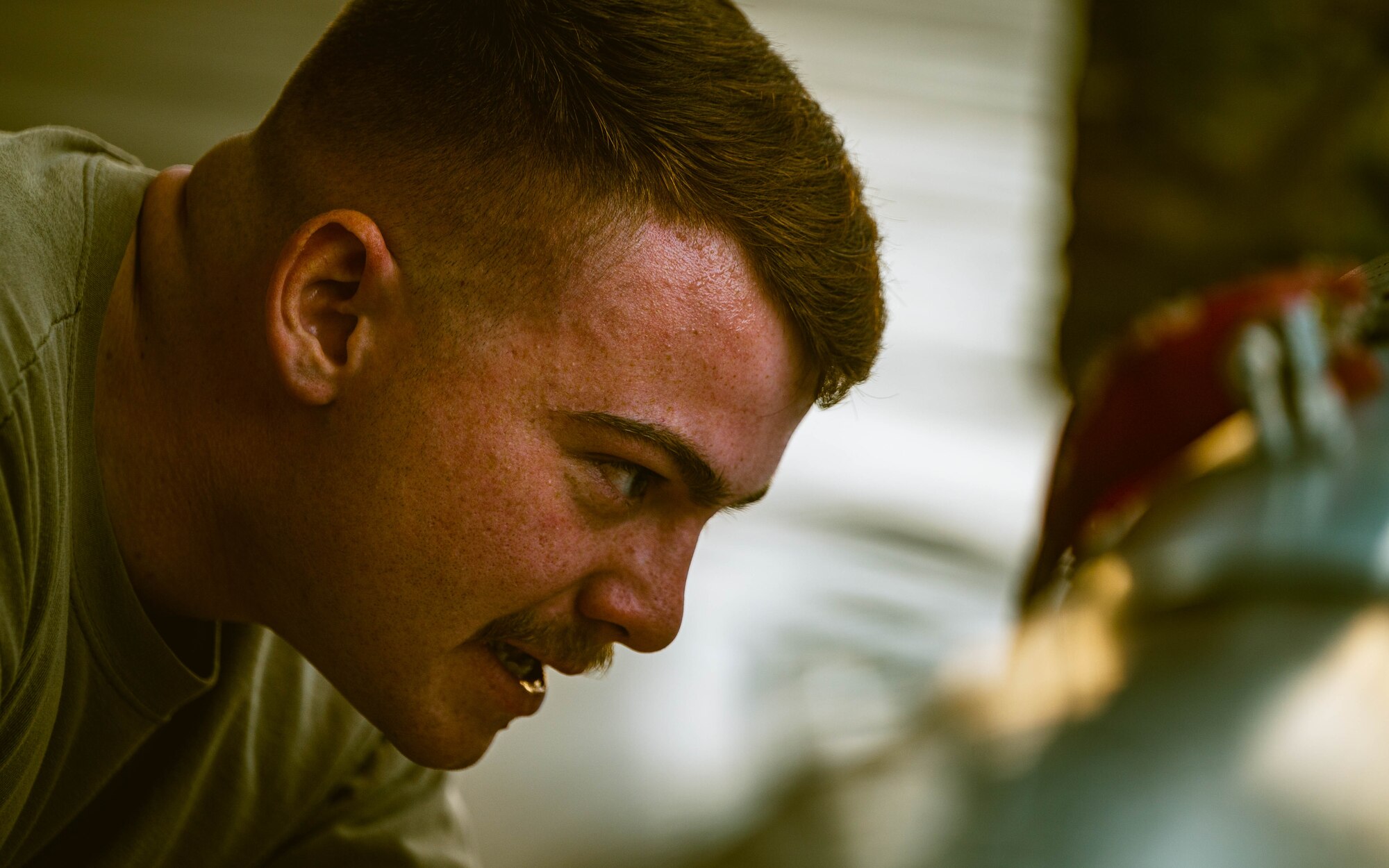 U.S. Air Force Airmen assigned to the 56th Fighter Wing participate in the second quarter weapons load competition