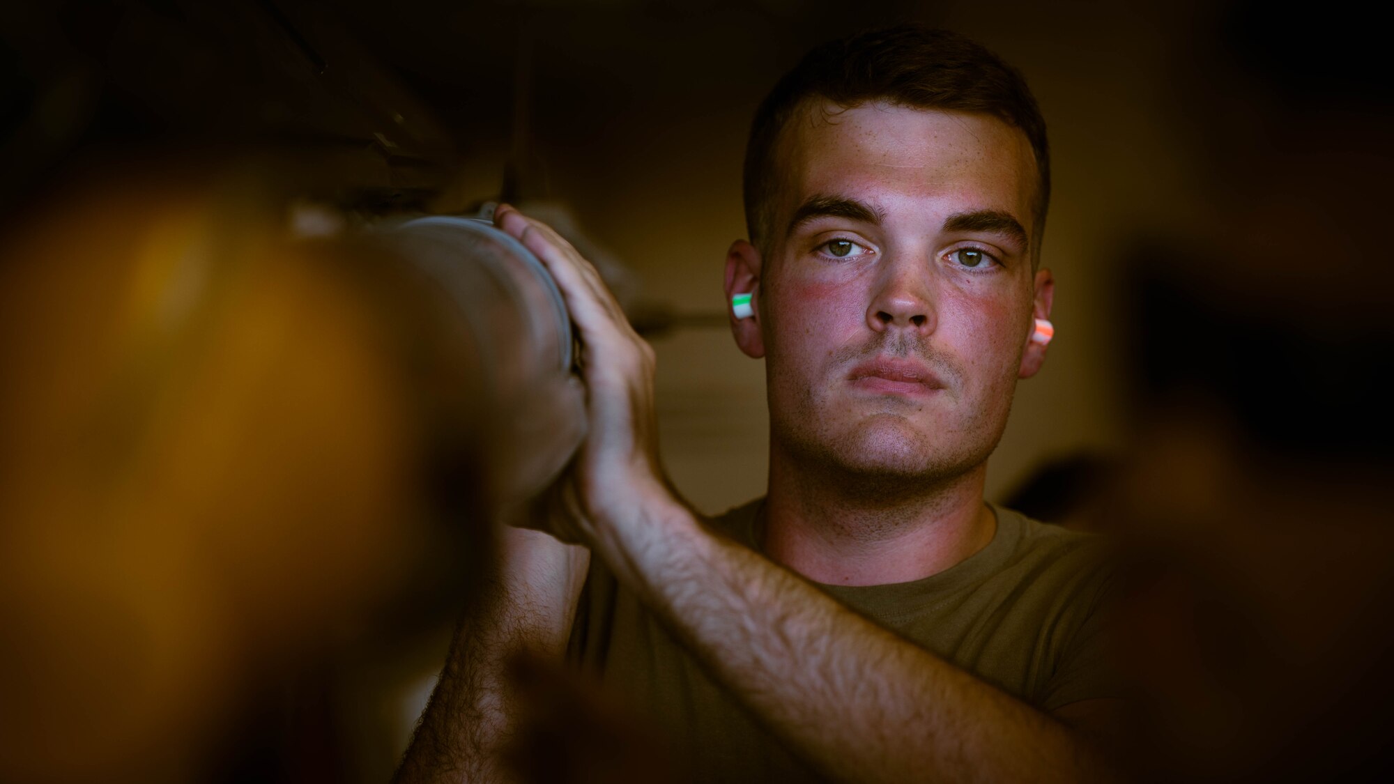 U.S. Air Force Airmen assigned to the 56th Fighter Wing participate in the second quarter weapons load competition
