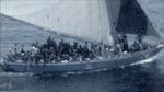 Surveillance of a Haitian sail freighter approximately 26 miles east of Punta de Maisi, Cuba, July 16, 2023. All people aboard were transferred to Bahamas, July 17, 2023. (U.S. Coast Guard photo)