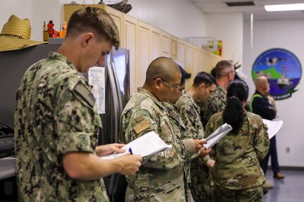 Joint Task Force Red-Hill (JTF-RH) personnel attend a brief prior to commencing the draining of the surge tanks at the Red Hill Bulk Fuel Storage Facility (RHBFSF) at Joint Base Pearl Harbor-Hickam, Hawaii, July 17, 2023. JTF-RH is in phase three of its five-phase defueling plan. Personnel are focused on completing quality control tasks, training, response preparation, the National Environmental Policy Act Environmental Assessment, regulatory approvals and operational planning for all major milestones. This extensive preparatory work will help ensure the safe and expeditious defueling of the RHBFSF. (DoD photo by U.S. Army Sgt. Kyler L. Chatman)