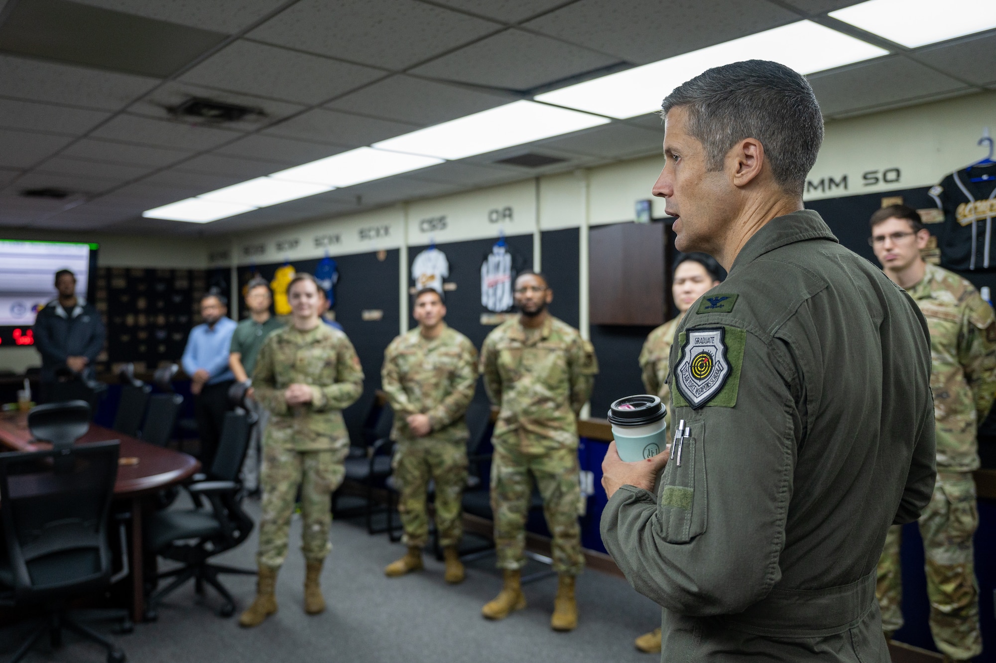 U.S. Air Force Col. William McKibban, 51st Fighter Wing commander, speaks with members of the 51st Communications Squadron at Osan Air Base, Republic of Korea, July 10, 2023.  Engaging directly with Airmen allows new command teams to build essential bonds of trust and appreciation for their invaluable contributions to mission success. (U.S. Air Force photo by Senior Airman Thomas Sjoberg)