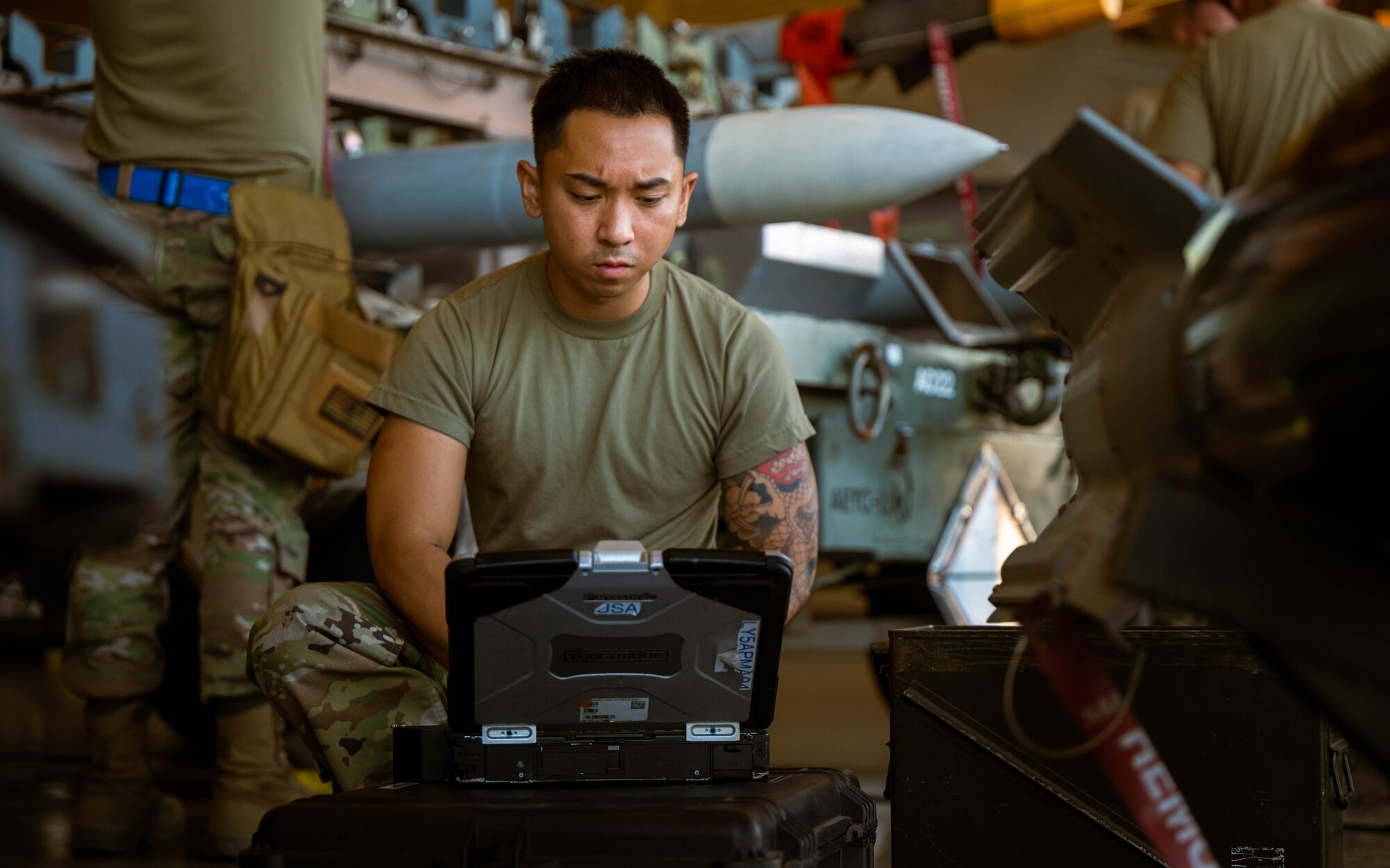 U.S. Air Force Airmen assigned to the 56th Fighter Wing participate in the second quarter weapons load competition