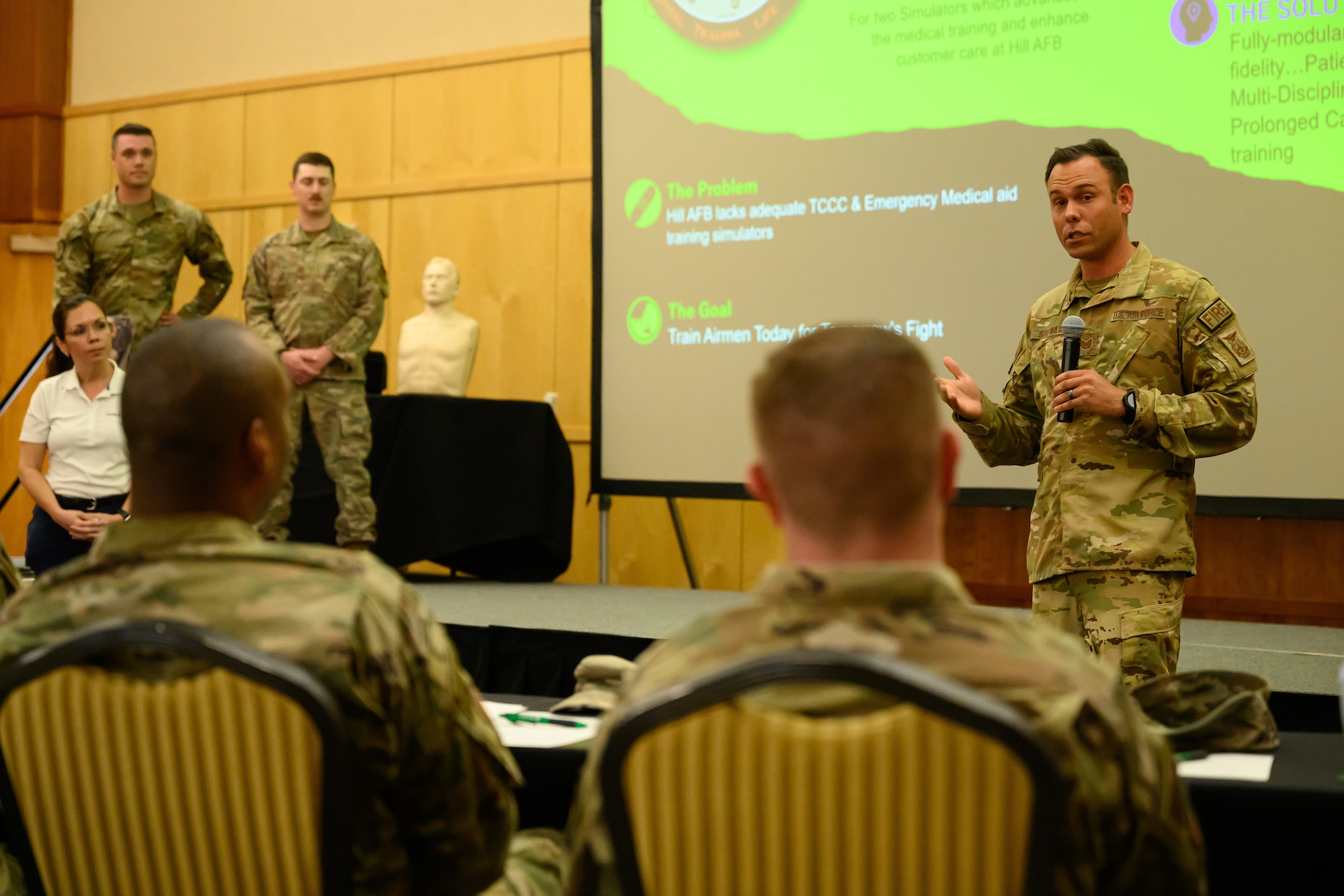 Tech Sgt. Thomas Stewart present an innovation idea to judges during a Spark Tank event at Hll Air Force Base, Utah, May 25, 2023. The event was part of the 2023 HAFB Innovation Days held May 22-25. The event featured training sessions, speakers and panels designed to help participants navigate the innovation ecosystem and help solve Department of the Air Force problems. (U.S. Air Force photo by R. Nial Bradshaw)