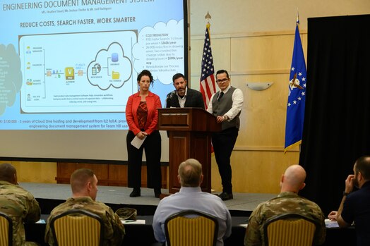  Center, from left, Heather Dauel, Joshua Cheifer and Joel Rogriguez, 775th Civil Engineer Group, present an innovation idea to the judges panel during a Spark Tank event at Hill Air Force Base, Utah, May 25, 2023.  The event was part of the 2023 HAFB Innovation Days held May 22-25. The event featured training sessions, speakers and panels designed to help participants navigate the innovation ecosystem and help solve Department of the Air Force problems. (U.S. Air Force photo by R. Nial Bradshaw)