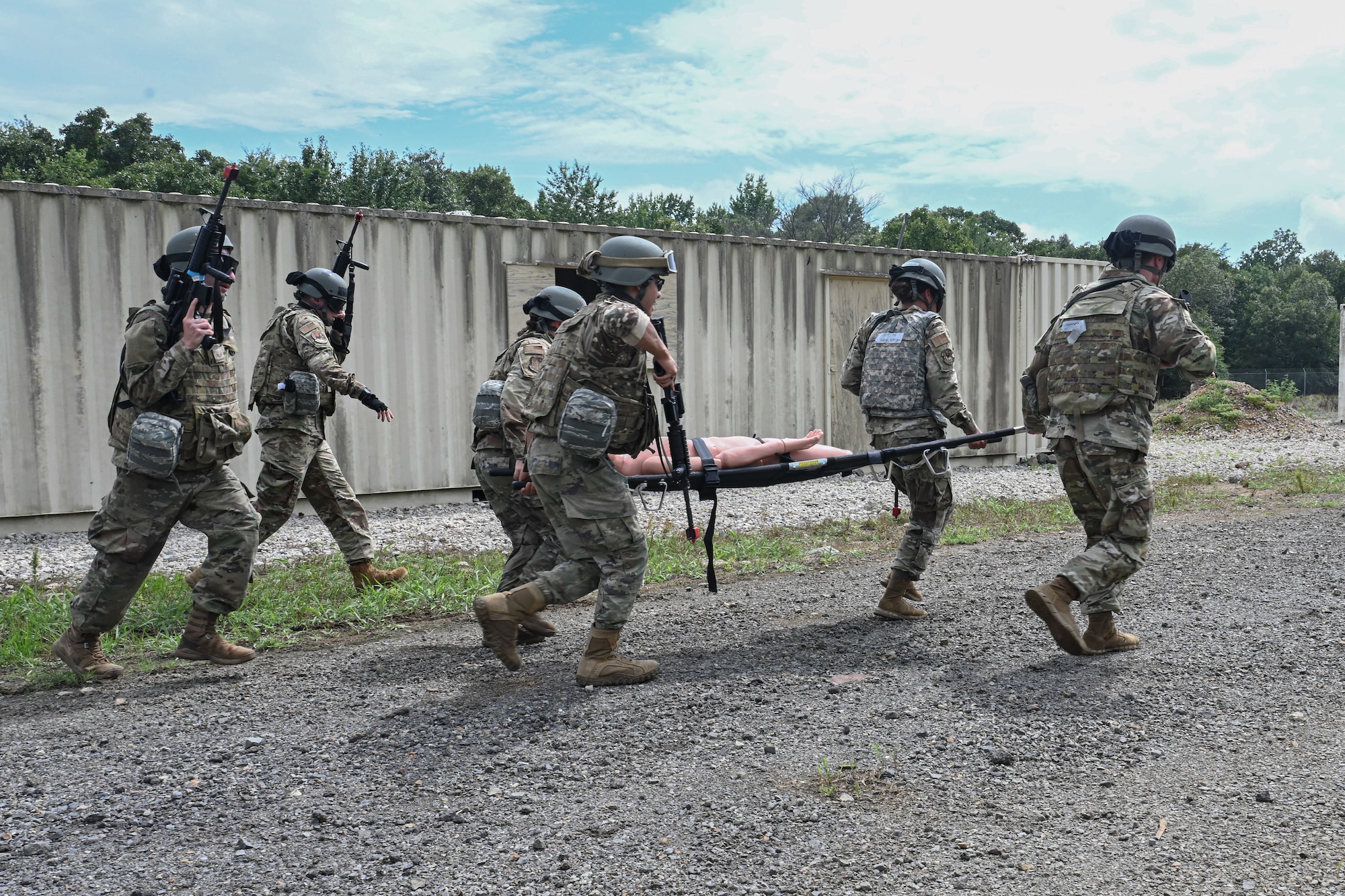 Airmen transport a simulated casualty