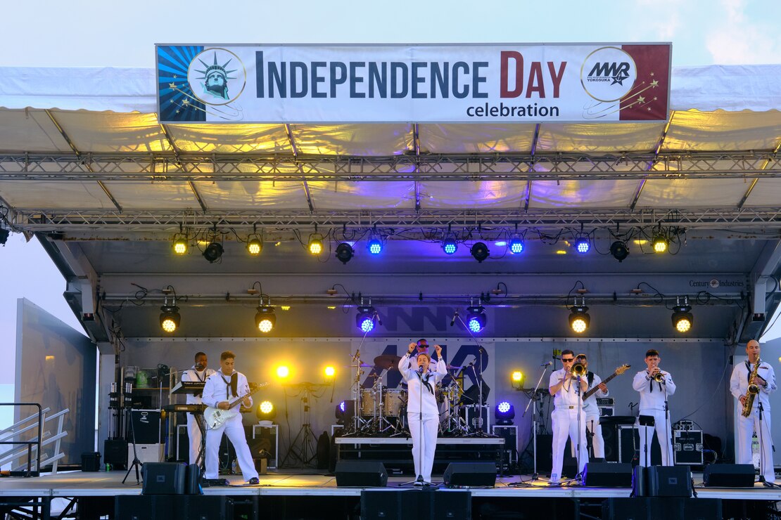 The 7th Fleet Band's Orient Express entertains community members from Commander, Fleet Activities Yokosuka at the 4th of July Independence Day Celebration in Yokosuka, Japan.