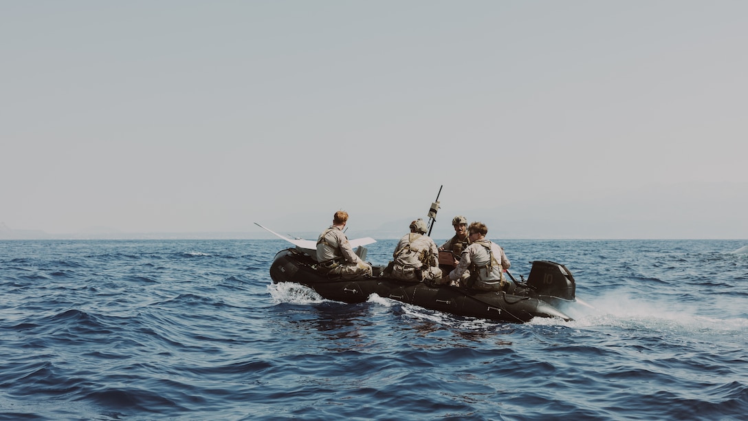 U.S. Marines with Force Company, 2d Reconnaissance Battalion, 2d Marine Division, under tactical control of Task Force 61/2, prepare to launch a RQ-20B Puma in Souda Bay, Greece on July 12, 2023. Task Force 61/2.5 provides naval and joint force commanders with dedicated multi-domain reconnaissance and counter reconnaissance (RXR) capabilities. (U.S. Marine Corps photo by Lance Cpl. Emma Gray)