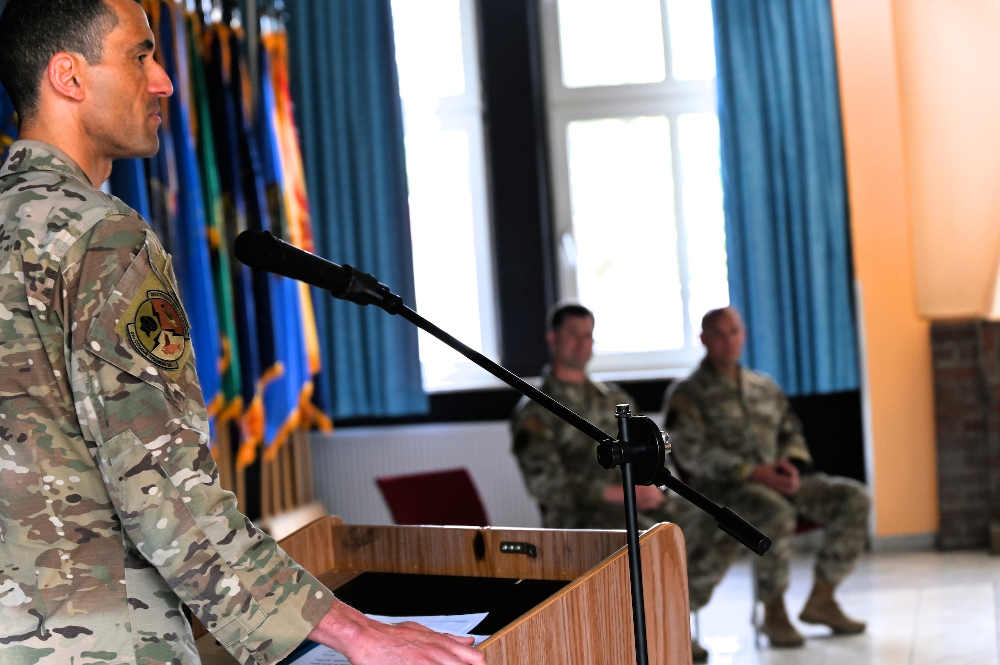 Lt. Col. Robert Montgomery, commander, 4th Combat Training Squadron says farewell to Lt. Col. Seth Ostlund, Detachment 1 outgoing commander and welcome to Maj. William West, incoming commander.