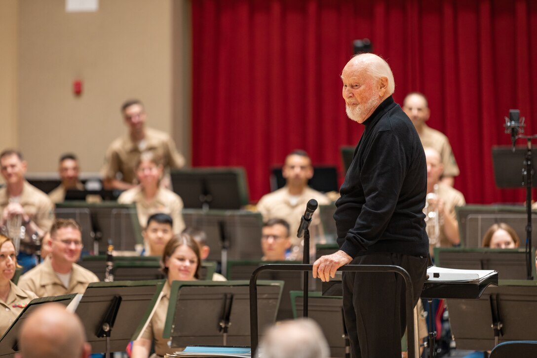 John Williams smiles from the podium during the United States Marine Band's rehearsal on July 15, 2023, the day before its 225th anniversary concert at The Kennedy Center for the Performing Arts.
(U.S. Marine Corps photo by Staff Sgt. Chase Baran/Released)