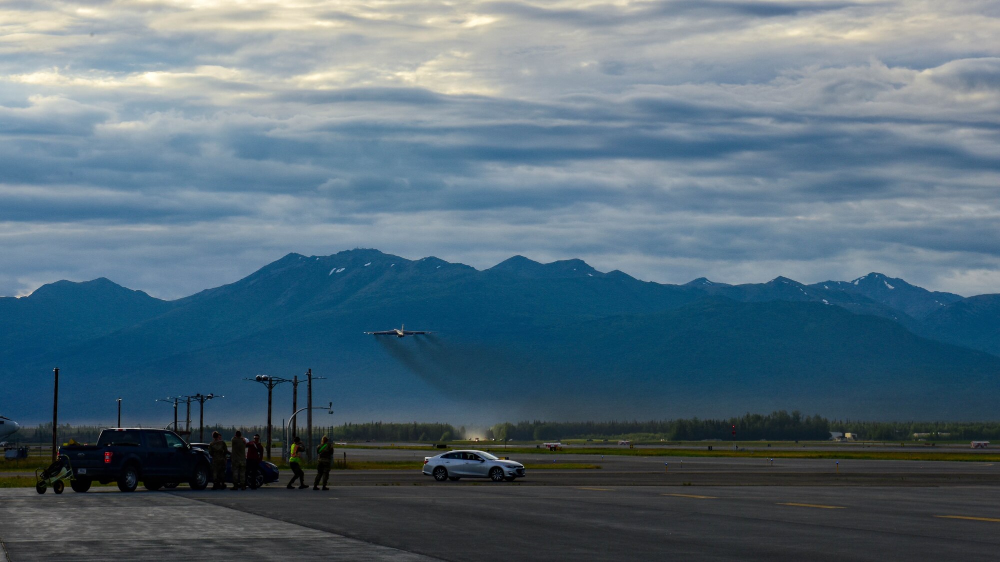 A B-52H Stratofortress assigned to the 69th Bomb Squadron from Minot Air Force Base, North Dakota, takes off in support of a bomber Agile Combat Employment (ACE) exercise at Joint Base Elmendorf-Richardson, Alaska, July 14, 2023. ACE enables convergence across domains, presenting an adversary with dilemmas at an operational tempo that complicates or negates adversary responses. (U.S. Air Force photo by Senior Airman Zachary Wright)
