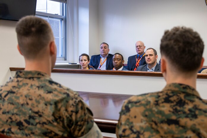 Mr. Jim Dietz, a hall of fame coach, presents a practical application brief to his fellow coaches at the coaches workshop on Marine Corps Base Quantico, Va, May 10, 2023. Coaches from across the nation travelled here to learn about the Marine Corps' officer programs. The purpose of the workshop is to create a mutually beneficial relationship between coaches and the Corps, where coaches share knowledge based on first-hand experience with colleagues, students and athletes.