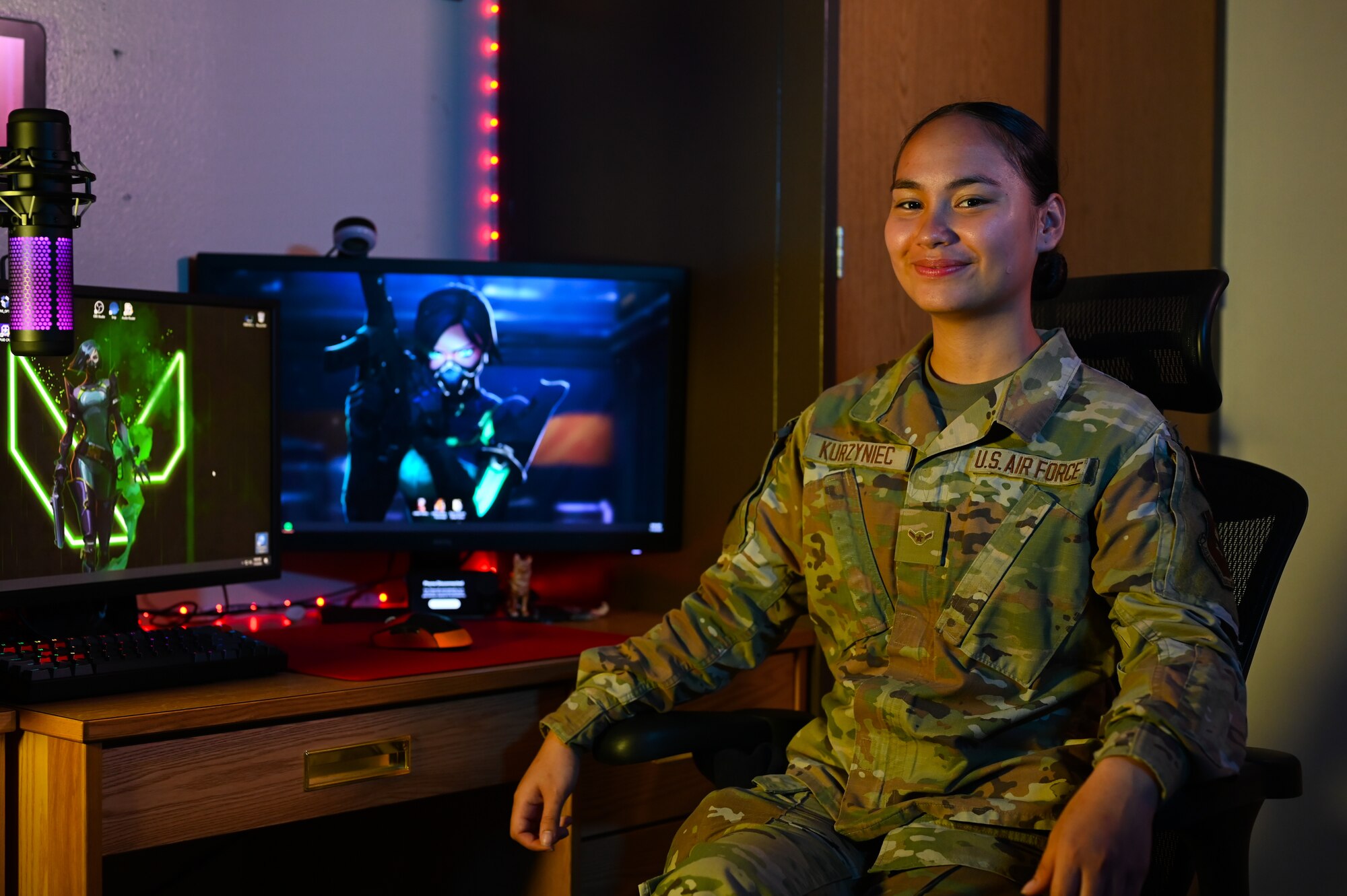 U.S. Air Force Airman Angelina Kurzyniec, 47th Security Forces Squadron patrolman and member of the Laughlin Gaming Team, sits at a computer at Laughlin Air Force Base, Texas, July 10, 2023.