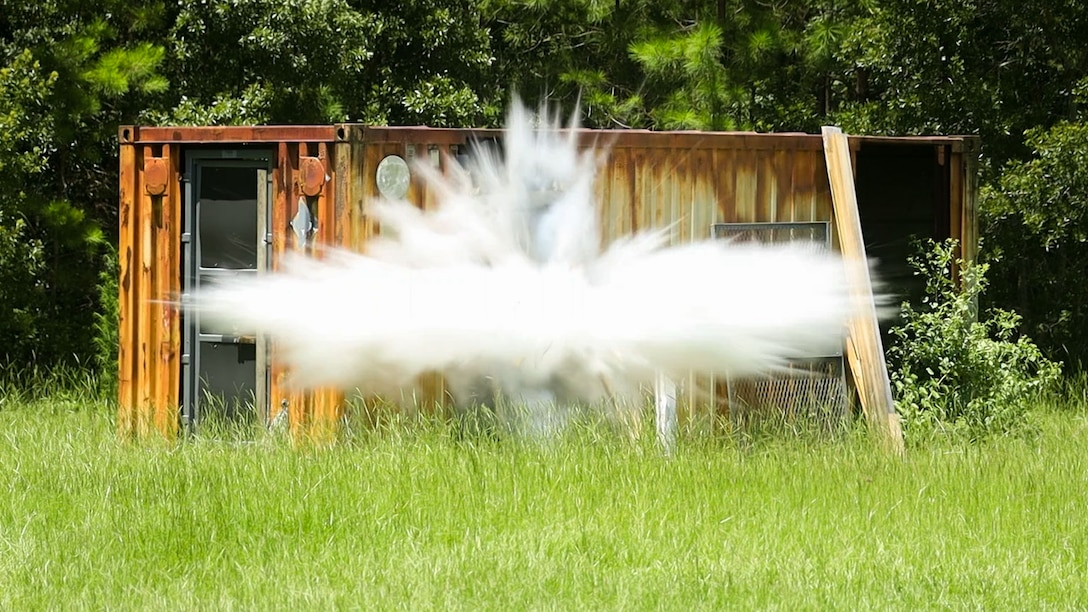 A breaching charge is detonated by explosive ordnance disposal technicians with Headquarters and Headquarters Squadron for a training exercise at Marine Corps Air Station Beaufort, South Carolina, July 6, 2023. EOD conducted training to reinforce proper breaching charge techniques.