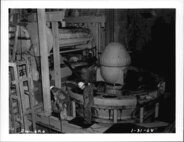 Instead of trucking the tons the rock to a crushing plant, an innovative method was devised to simplify the process. Contractors tunneled into the mountain, creating a vertical chute and carving out a cave. Inside this cave, which was about 87 feet long, 34 feet wide and 102 feet high, they installed the crushing plant.