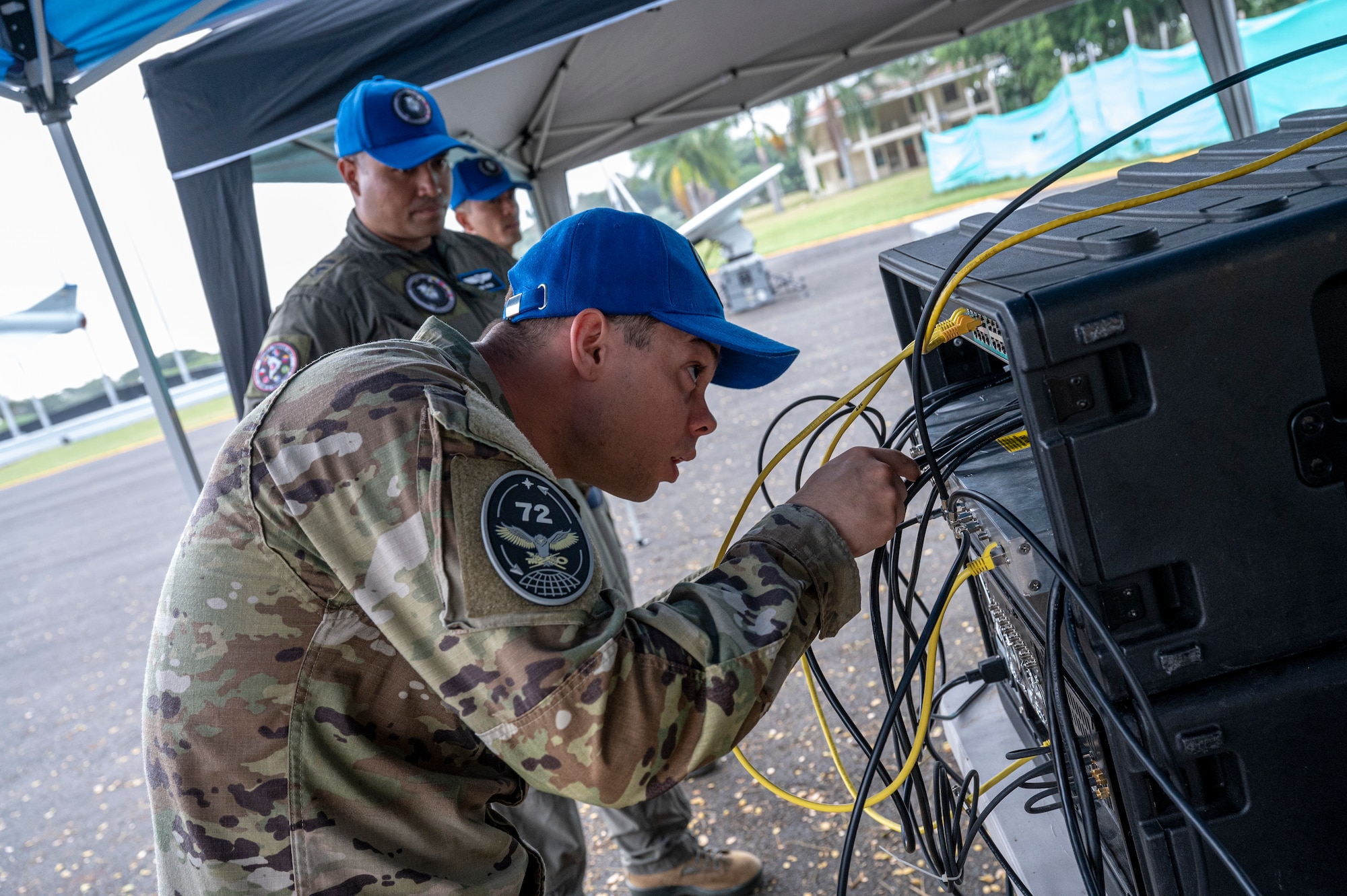 A U. S. Space Force Guardian trains with a Colombian Air Force member on the Multi-band Assessment of the Communication Environment (MACE) system as part of Operation Thundergun Express, a 21-day space deployment exercise nested under Resolute Sentinel 23. MACE is a rapidly-deployable, cost-effective, user friendly spectrum analysis and monitoring tool that was key in demonstrating space Agile Combat Employment capabilities during the exercise.  (U. S. Air Force Photo by Staff Sgt. Matthew Matlock)