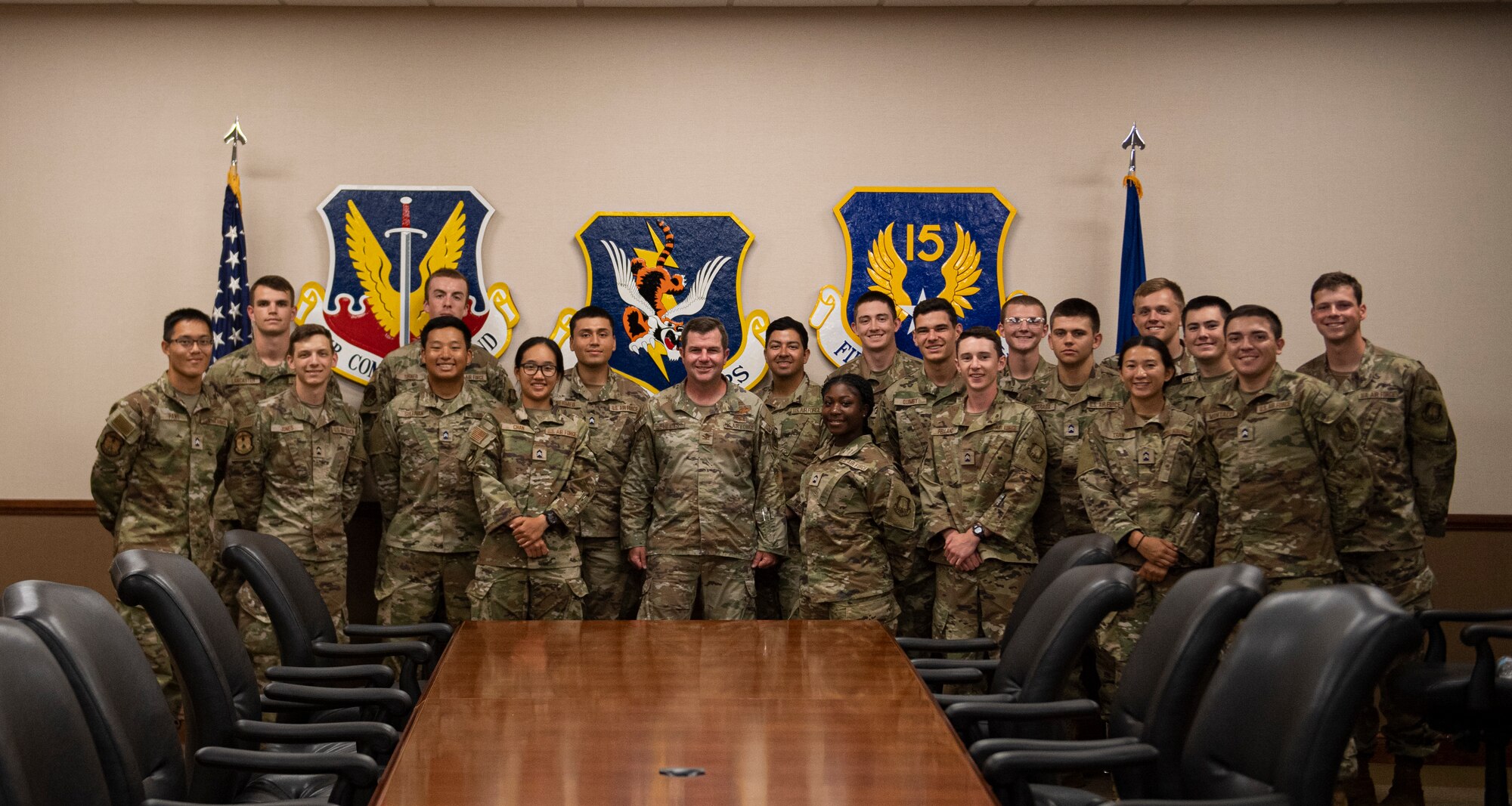 pose for a photo with commander