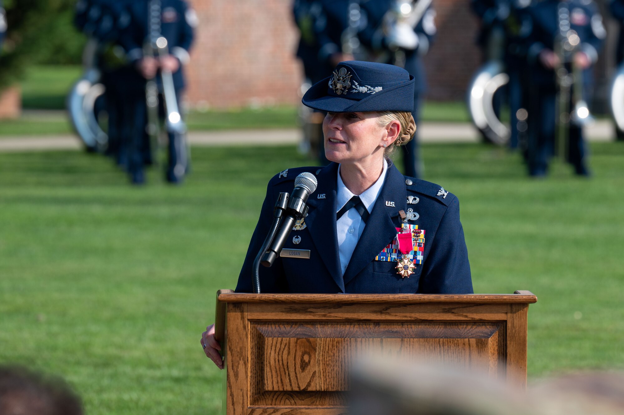 U.S. Air Force Col. Catherine “Cat” Logan, outgoing commander of Joint Base Anacostia-Bolling and the 11th Wing, provides her final remarks as commander during a change of command ceremony at JBAB, Washington, D.C., July 18, 2023. Logan became the first female commander of JBAB and the 11th Wing in 2021. Under Logan’s command, JBAB reached Full Operating Capability, completed more than $58 million in base infrastructure projects to include quality of life improvements, executed two Air Force 75th Anniversary Tattoo celebrations and deployed personnel for the first time since the lead service transfer in 2020. (U.S. Air Force photo by Kristen Wong)