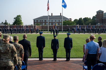 U.S. Air Force Maj. Gen. Joel D. Jackson, right, Air Force District of Washington and 320th Air Expeditionary Wing commander; Col. Catherine “Cat” Logan, center, outgoing commander of Joint Base Anacostia-Bolling and the 11th Wing; and Col. Ryan A. F. Crowley, left, incoming commander of JBAB and the 11th Wing, stand at attention while colors are presented during a change of command ceremony at JBAB, Washington, D.C., July 18, 2023. Logan relinquished command to Crowley, making him the third wing commander at JBAB since the Air Force assumed authority of the installation from the U.S. Navy during the Department of Defense’s first-ever joint base lead service transfer in 2020. (U.S. Air Force photo by Kristen Wong)