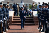 U.S. Air Force Col. Catherine “Cat” Logan, outgoing commander of Joint Base Anacostia-Bolling and the 11th Wing, departs the change of command ceremony at JBAB, Washington, D.C., July 18, 2023, after relinquishing command to Col. Ryan A. F. Crowley. Logan became the first female commander of JBAB and the 11th Wing in 2021. Under Logan’s command, JBAB reached Full Operating Capability, completed more than $58 million in base infrastructure projects to include quality of life improvements, executed two Air Force 75th Anniversary Tattoo celebrations and deployed personnel for the first time since the lead service transfer in 2020.  (U.S. Air Force photo by Kristen Wong)