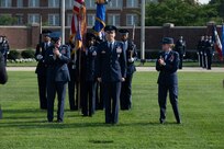 U.S. Air Force Col. Ryan A. F. Crowley, center, commander of JBAB and the 11th Wing, officially takes command during a change of command ceremony at JBAB, Washington, D.C., July 18, 2023. Crowley is the third wing commander at JBAB since the Air Force assumed authority of the installation from the U.S. Navy during the Department of Defense’s first-ever lead service transfer in 2020. (U.S. Air Force photo by Kristen Wong)