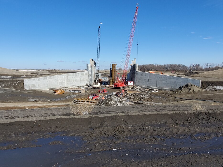 Constructtion taking place on the bank of the Red River.