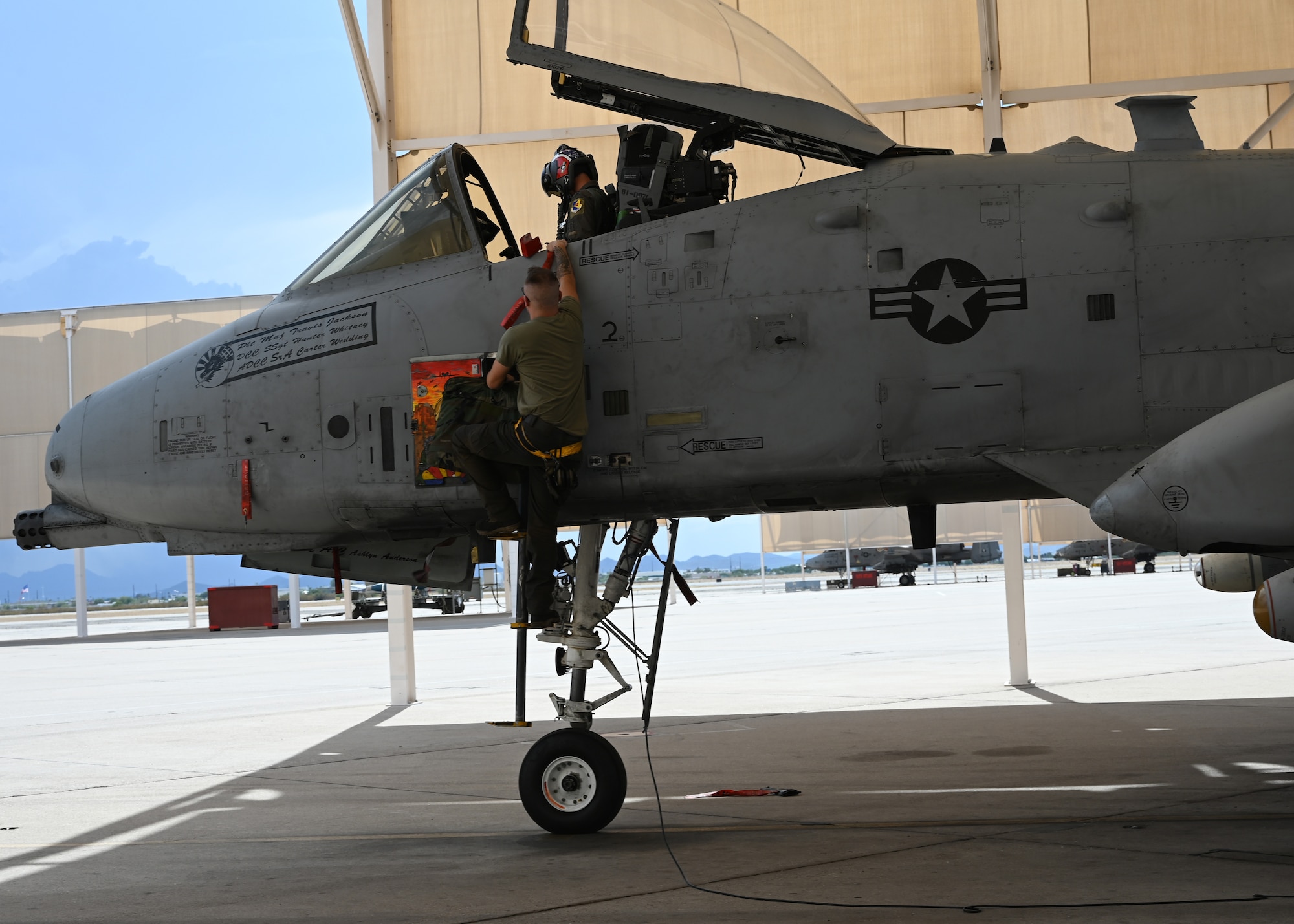 U.S. Air Force Senior Airman Thomas Snyder, 357th Fighter Generation Squadron crew chief, performs a post flight check on an A-10C Thunderbolt II aircraft at Davis-Monthan Air Force Base, Ariz. July 17, 2023. Snyder has been a crew chief at DM for three years. (U.S. Air Force photo by Staff Sgt. Abbey Rieves)
