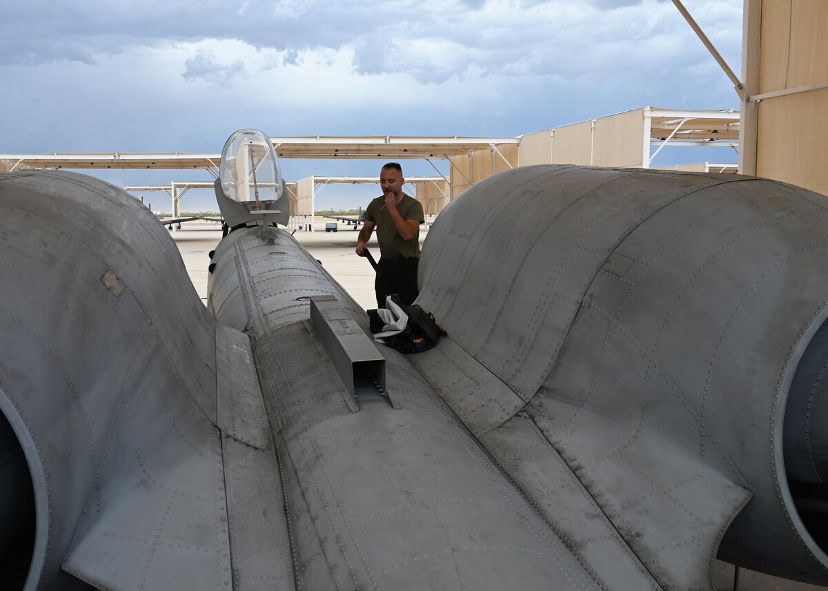 U.S. Air Force Senior Airman Thomas Snyder, 357th Fighter Generation Squadron crew chief, conducts recovery checks on an A-10C Thunderbolt II aircraft at Davis-Monthan Air Force Base, Ariz. July 17, 2023. As a crew chief, Snyder was responsible for the maintenance and repair of aircraft. (U.S. Air Force photo by Staff Sgt. Abbey Rieves)