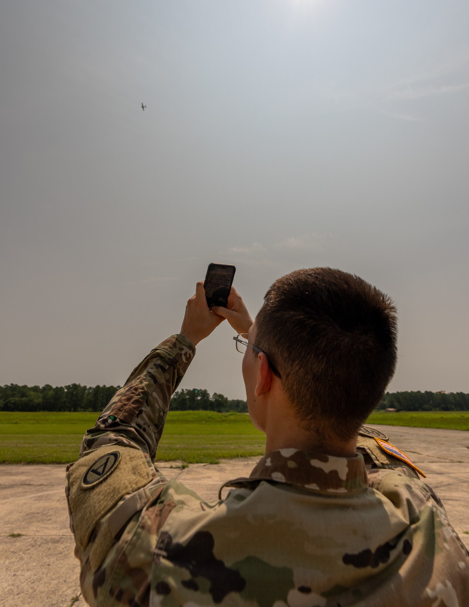 Sgt. Mickey Reeve, Ops NCO for USARCENT's Task Force 39, demonstrates how to launch a drone at McEntire Joint National Guard Base, S.C., on July 17, 2023. The drone was used to support the CARPE Dronvm testing on 18 July, 2023. (U.S. Army photo by Staff Sgt. Leo Jenkins)