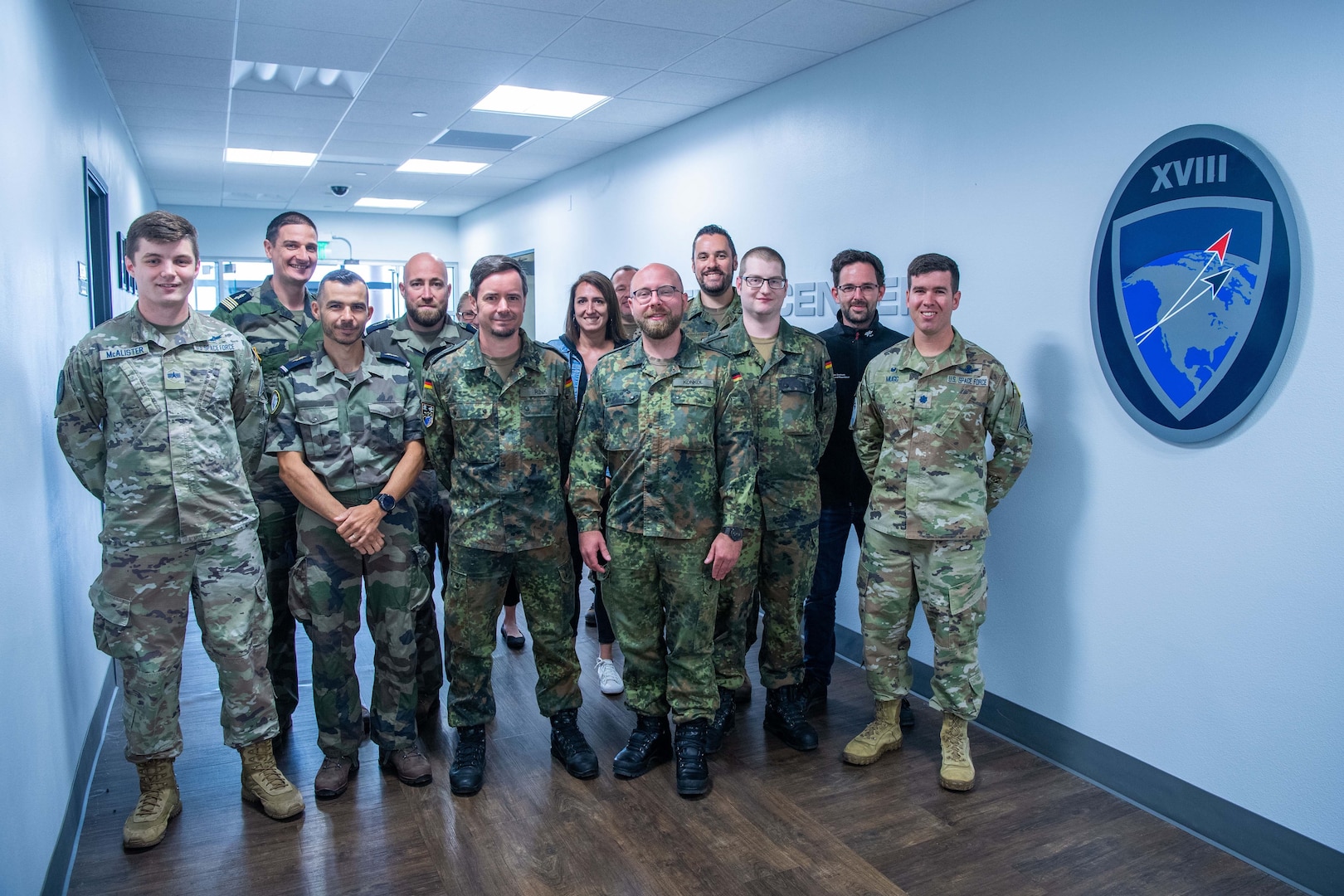 Members from the Operational Center for Military Surveillance of Space Objects, German Space Situational Awareness Centre and the 18th Space Defense Squadron pose for a photo at the 18 SDS at Vandenberg Space Force Base, Calif., July 10, 2023. 18 SDS processes space surveillance network data to monitor all activity to, in, and from space, and maintains custody of all resident space objects to provide and advance a continuous, comprehensive, and combat-relevant understanding of the space situation. This first-ever German-French operator exchange aimed to advance global Space Domain Awareness by exchanging best practices, capabilities, and technologies. (U.S. Space Force photo by Julian Labit)