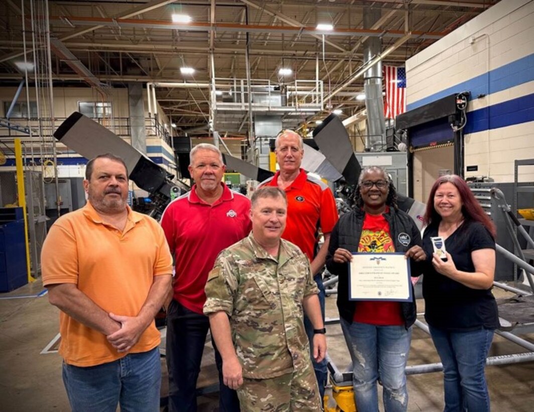Six members from DLA Aviation at Warner Robins Commodities Materiel Management and Planning and Support Divisions were recognized as part of the C-130 Hercules Propeller Barrel Cracking Recovery Materiel Support Team for their response to the grounding of over 100 Marine C-130 Hercules aircraft .