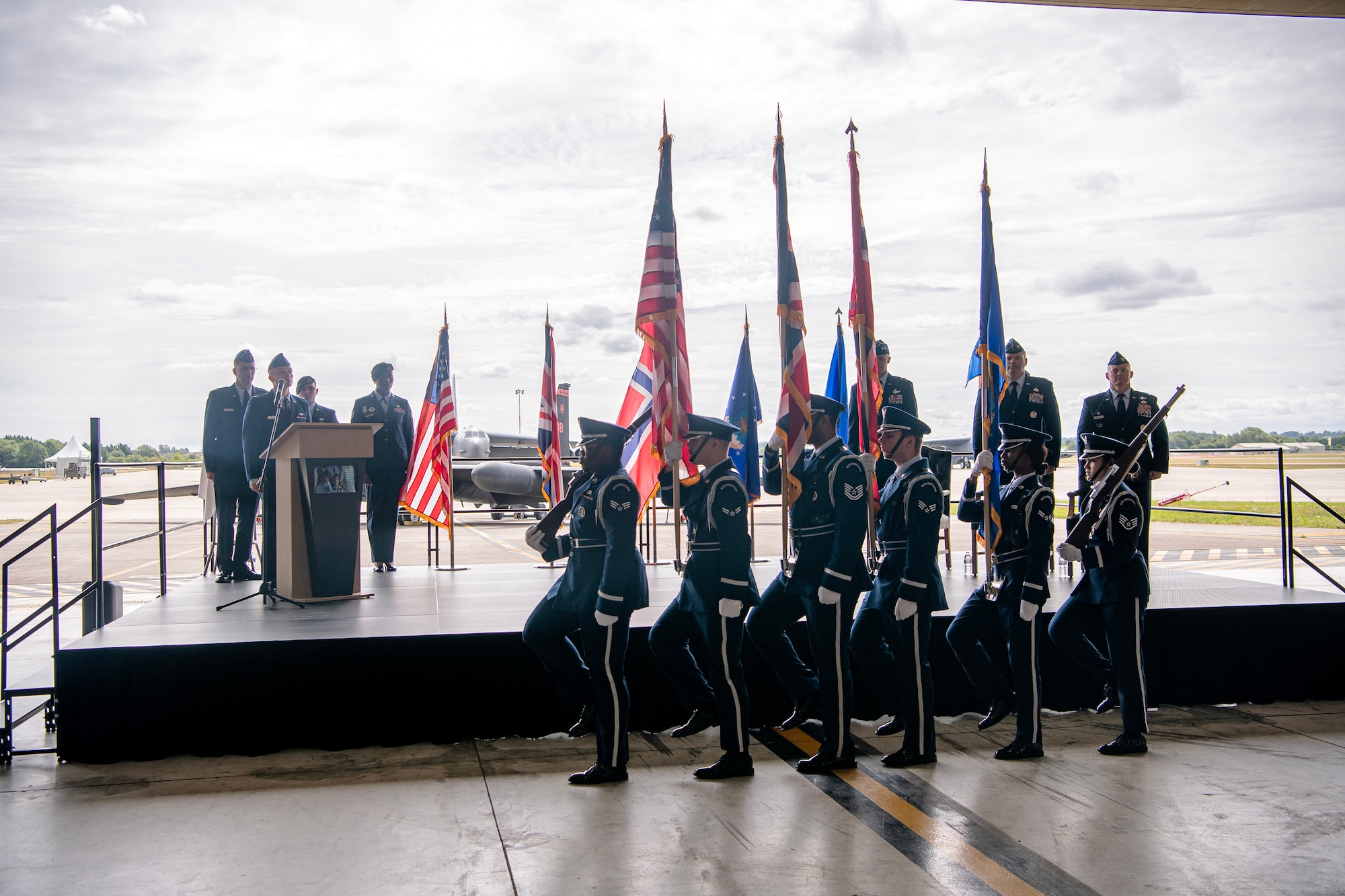 Airmen from the 423d Air Base Group Honor Guard present the colors during a change of command ceremony at RAF Fairford, England, July 18, 2023. The change of command ceremony signifies the transition of responsibility and command from one party to another. (U.S. Air Force photo by Staff Sgt. Eugene Oliver)