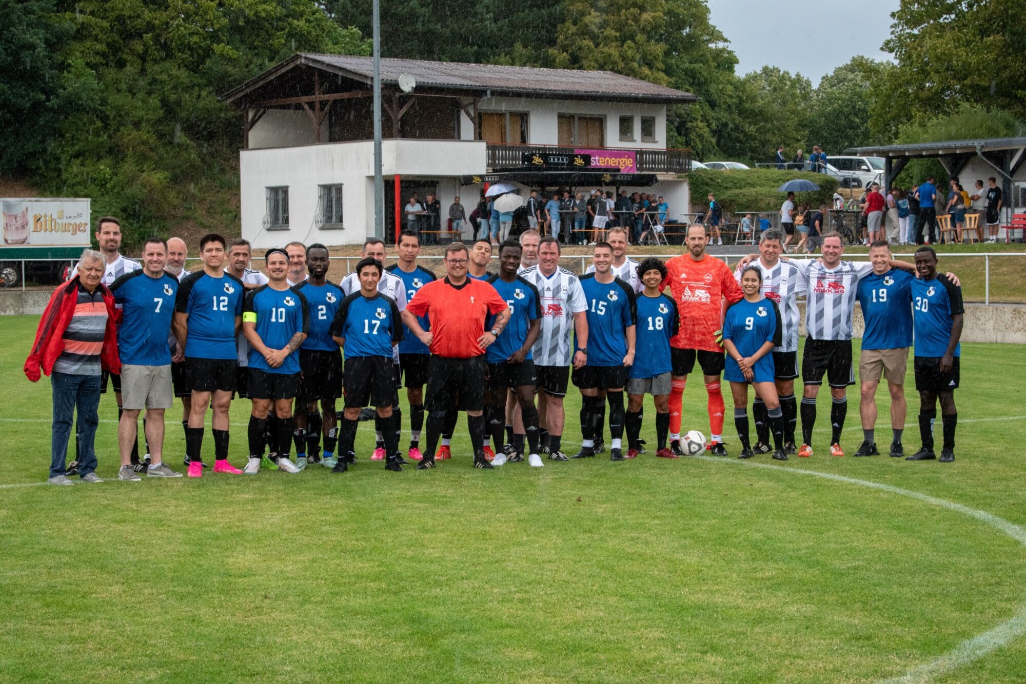 Members of the Spangdahlem Air Base soccer team and Binsfeld team pose in Binsfeld, Germany, July 15, 2023.