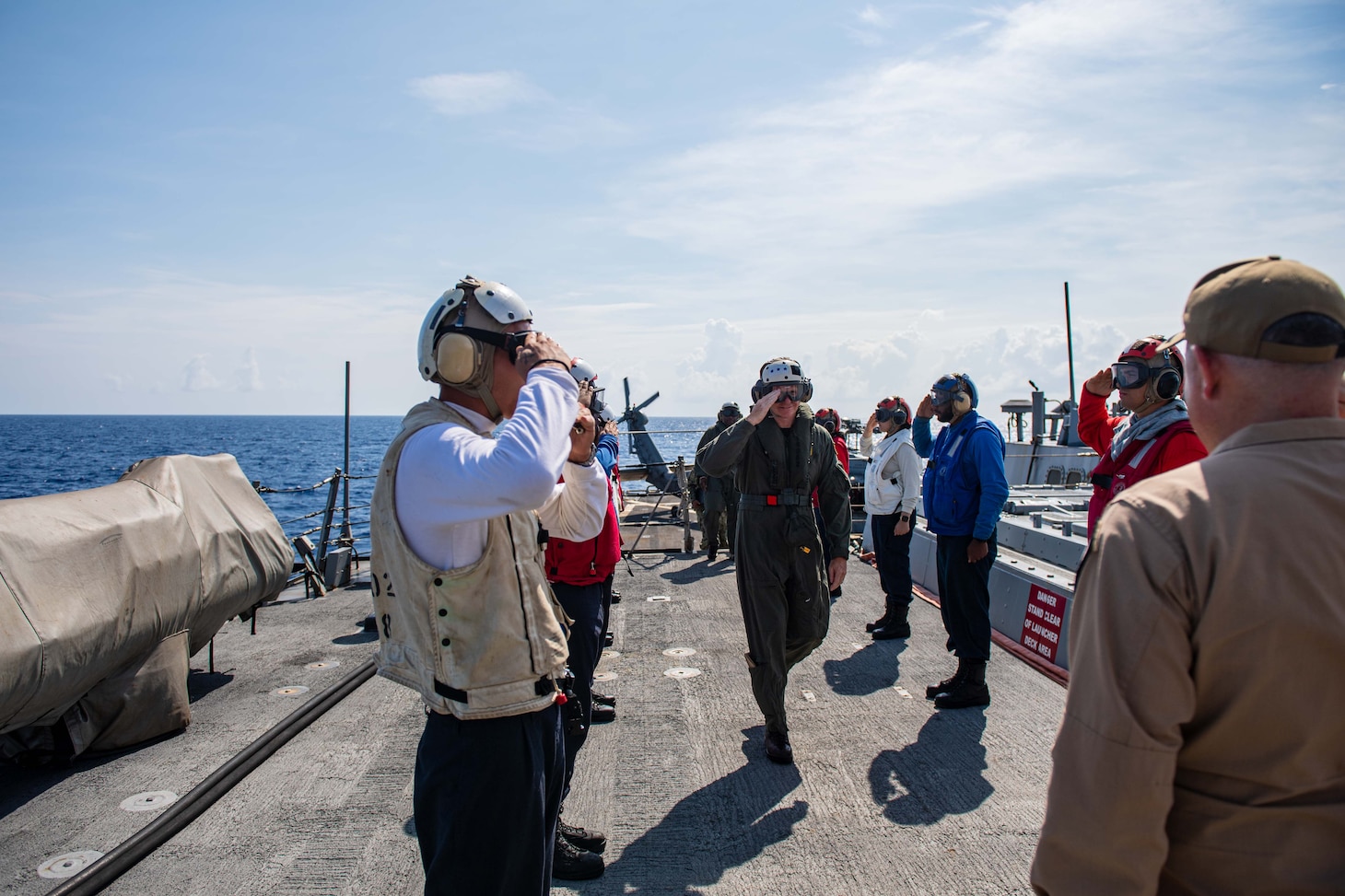 U.S. Navy Vice Admiral Daniel Dwyer, commander, Joint Force Command Norfolk/U.S. Second Fleet, walks through the sideboys aboard the Arleigh Burke-class guided-missile destroyer USS Laboon (DDG 58) July 8, 2023, in the Atlantic Ocean.