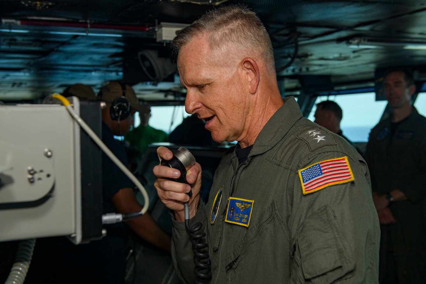 Vice Adm. Dan Dwyer, commander, U.S. Second Fleet, addresses the crew aboard the Nimitz-class aircraft carrier USS Dwight D. Eisenhower (CVN 69).