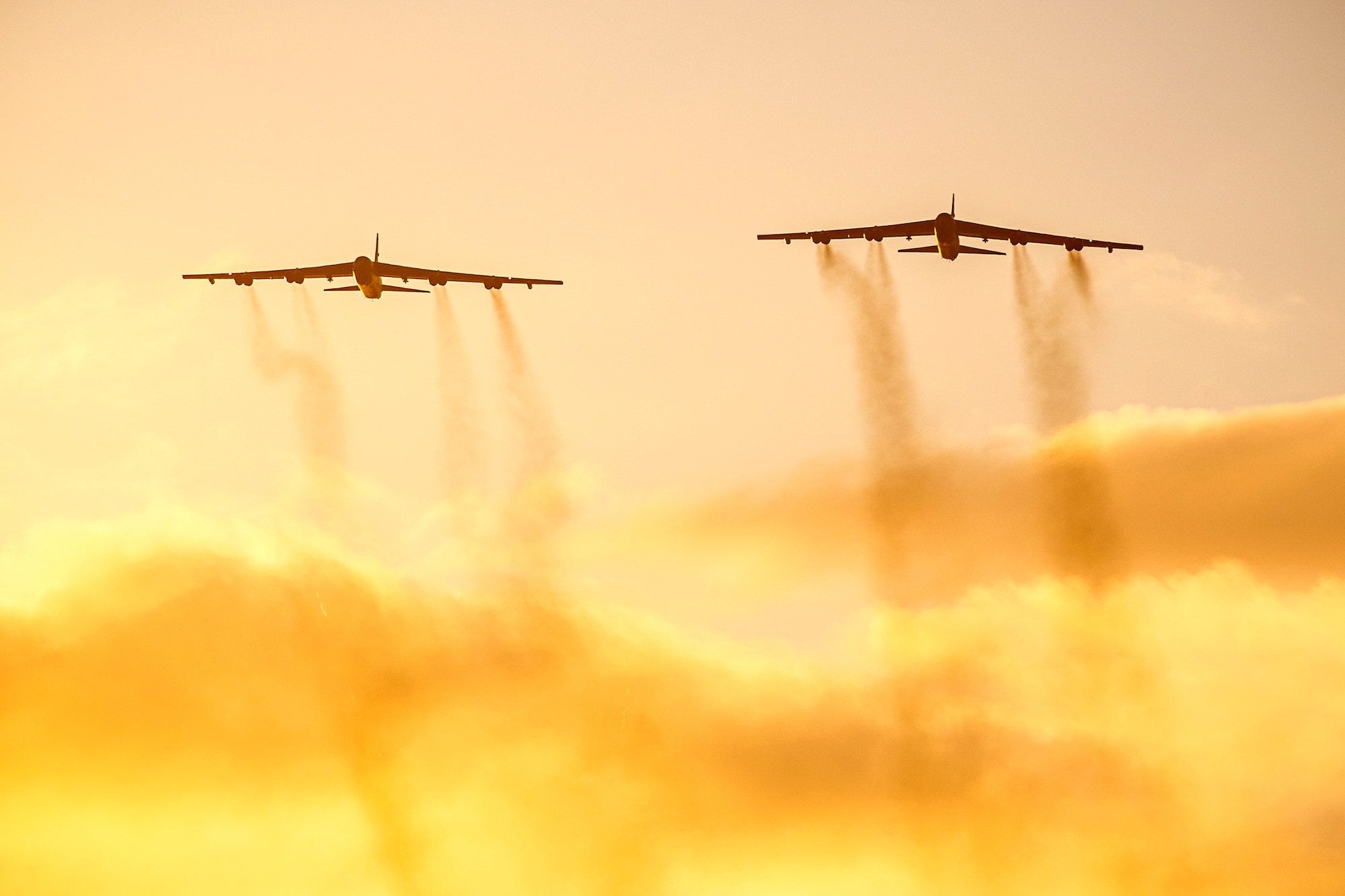 Two B-52 Stratofortresses fly over Royal Air Force Station Fairford, United Kingdom, Aug. 22, 2020. Strategic bombers contribute to European theater stability as they are intended to deter conflict and offer a rapid response capability. (U.S. Air Force photo by Senior Airman Eugene Oliver)