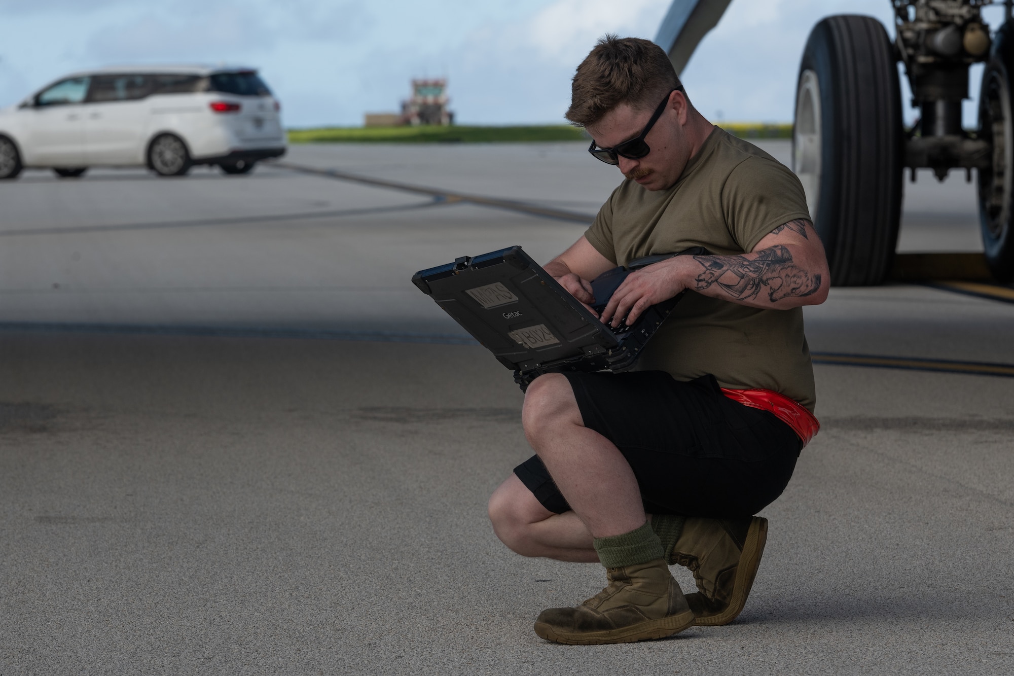 U.S. Air Force Airman 1st Class Jerid Shirley-Gessel, 5th Aircraft Maintenance Squadron crew chief, checks technical orders during routine maintenance on a U.S. Air Force B-52H Stratofortress assigned to the 23rd Expeditionary Bomb Squadron while deployed in support of Bomber Task Force operations at Andersen Air Force Base, Guam, June 14, 2023. BTF missions like this enable Airmen to maintain a high state of readiness and proficiency, and validate U.S. Strategic Command’s always-ready, global strike capability. (U.S. Air Force photo by Tech. Sgt. Zade Vadnais)