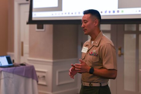 U.S. Marine Corps LtCol Sam Hong, president of the United States Marine Corps Asian Pacific Americans Professionals, addresses attendees of the USMC APA Professionals Leadership Summit 2023 aboard Marine Corps Base Quantico, Virginia, on April 26, 2023.