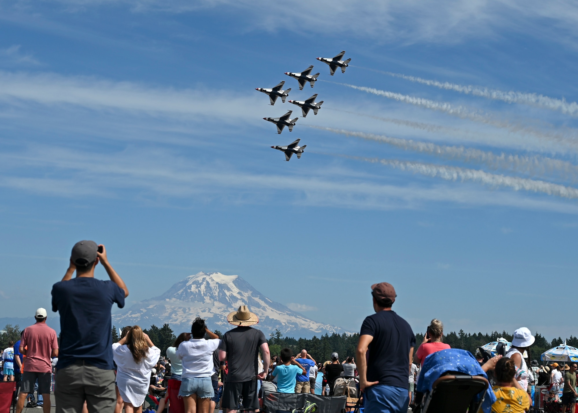 The U.S. Air Force Air Demonstration Squadron “Thunderbirds” fly F-16 Fighting Falcons above the McChord Field flightline during the Joint Base Lewis-McChord Airshow and Warrior Expo at JBLM, Washington, July 16, 2023. The mission of the JAWE is to foster goodwill to educate and familiarize attendees with the people, mission, and equipment of the Air Force, Army, and other Armed Services while continuing to provide installation-wide mission support. The Thunderbirds were one of the JAWE’s premier acts and were joined by aerial demonstrations from the C-17 West Coast Demonstration Team, Tora! Tora! Tora! and many more. (U.S. Air Force photo by Senior Airman Callie Norton)