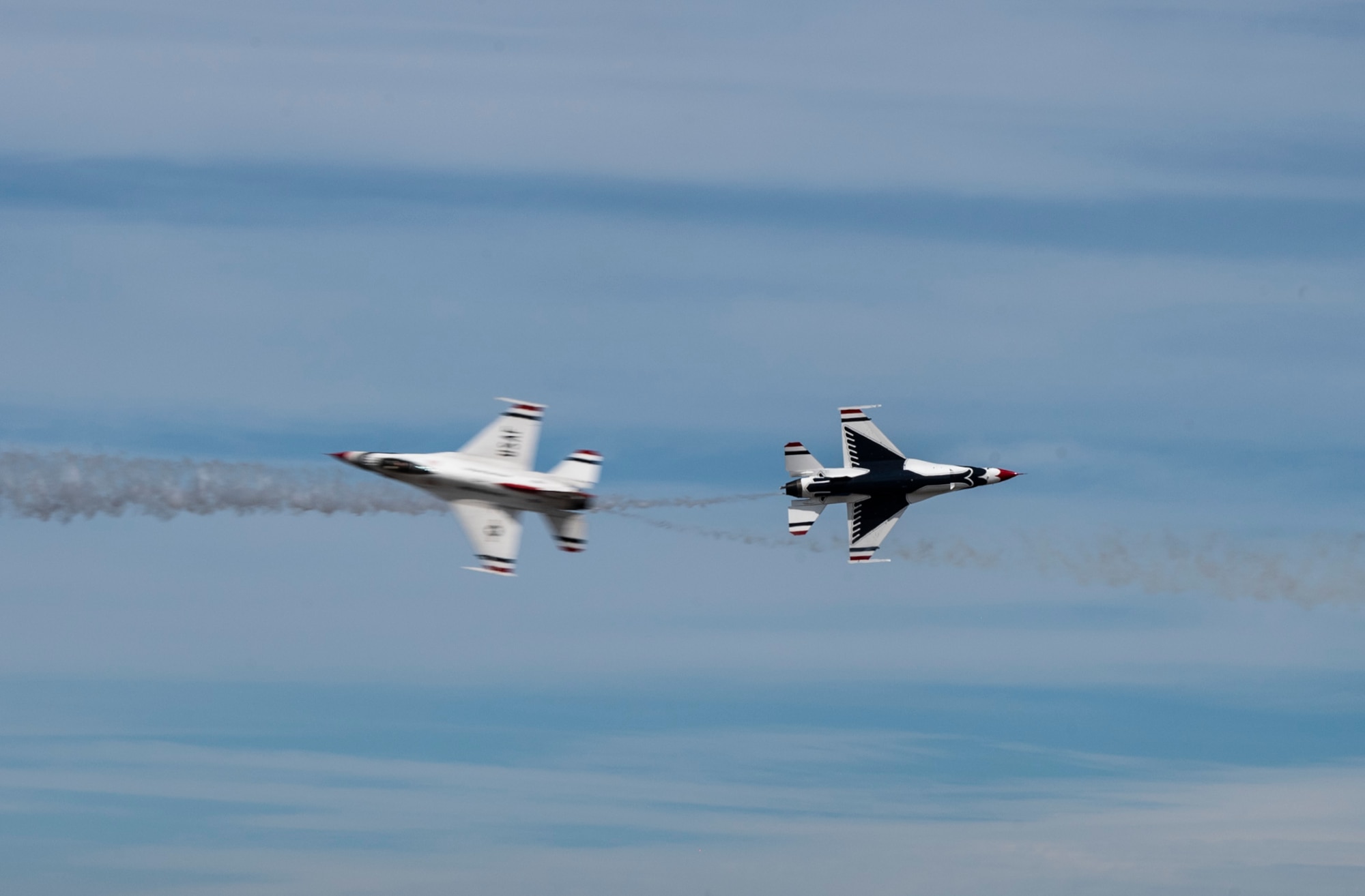 The U.S. Air Force Air Demonstration Squadron “Thunderbirds” fly F-16 Fighting Falcon aircraft above the McChord Field flightline while performing during the Joint Base Lewis-McChord Airshow and Warrior Expo at JBLM, Washington, July 16, 2023. The mission of the JAWE is to foster goodwill to educate and familiarize attendees with the people, mission, and equipment of the Air Force, Army, and other Armed Services while continuing to provide installation-wide mission support. The Thunderbirds were one of the JAWE’s premier acts and were joined by aerial demonstrations from the C-17 West Coast Demonstration Team, Tora! Tora! Tora! and many more. (U.S. Air Force photo by Staff Sgt. Rachel Williams)