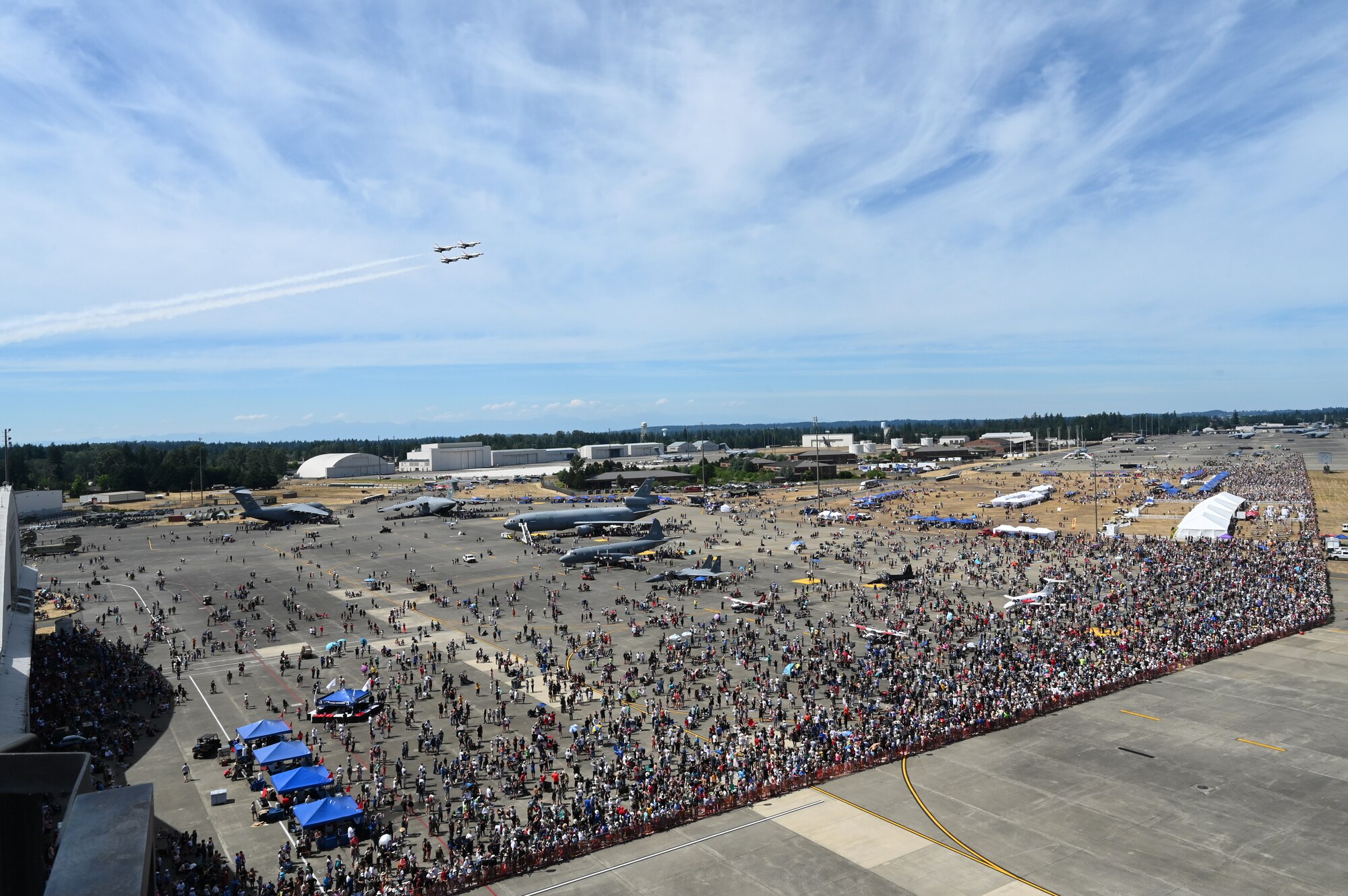 The U.S. Air Force Air Demonstration Squadron “Thunderbirds” #1-4 fly F-16 Fighting Falcons above the McChord Field flightline during the Joint Base Lewis-McChord Airshow and Warrior Expo at JBLM, Washington, July 16, 2023. The mission of the JAWE was to foster goodwill to educate and familiarize attendees with the people, mission, and equipment of the Air Force, Army, and other Armed Services while continuing to provide installation-wide mission support. The Thunderbirds were one of the JAWE’s premier acts and were joined by aerial demonstrations from the C-17 West Coast Demonstration Team, Tora! Tora! Tora! and many more. (U.S. Air Force photo by Senior Airman Colleen Anthony)