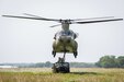 Soldiers with Company A, 628th Aviation Support Battalion, Pennsylvania Army National Guard, conduct sling-load operations with a CH-47F Chinook helicopter operated by Soldiers with Company B, 2nd Battalion, 211th General Support Aviation Battalion, Iowa Army National Guard, at Camp Dodge in Johnston, Iowa, June 15, 2023.