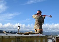 airman with sledge hammer