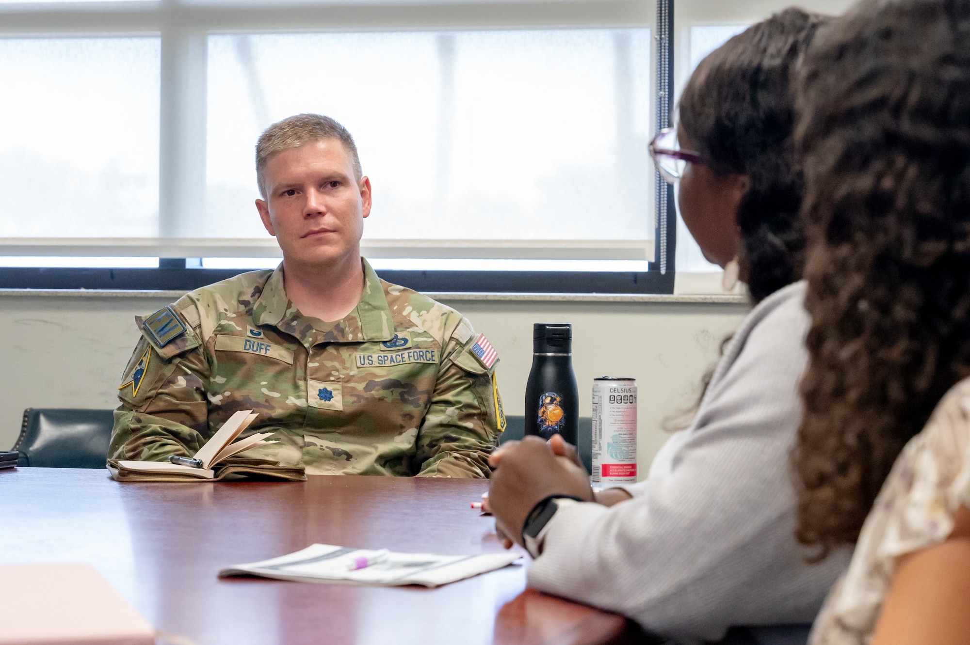 U.S. Space Force Lt. Col. Garrett Duff, 45th Comptroller Squadron commander, sits in on a finance brief at Patrick Space Force Base, Florida, July 13, 2023. Duff took command of the 45th Comptroller Squadron on June 23, 2023. (U.S. Space Force photo by Senior Airman Dakota Raub)